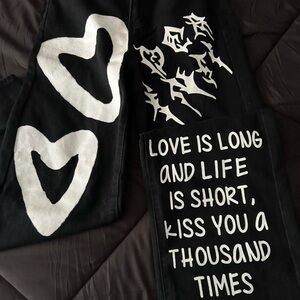 Black Pants with White Graphic Design